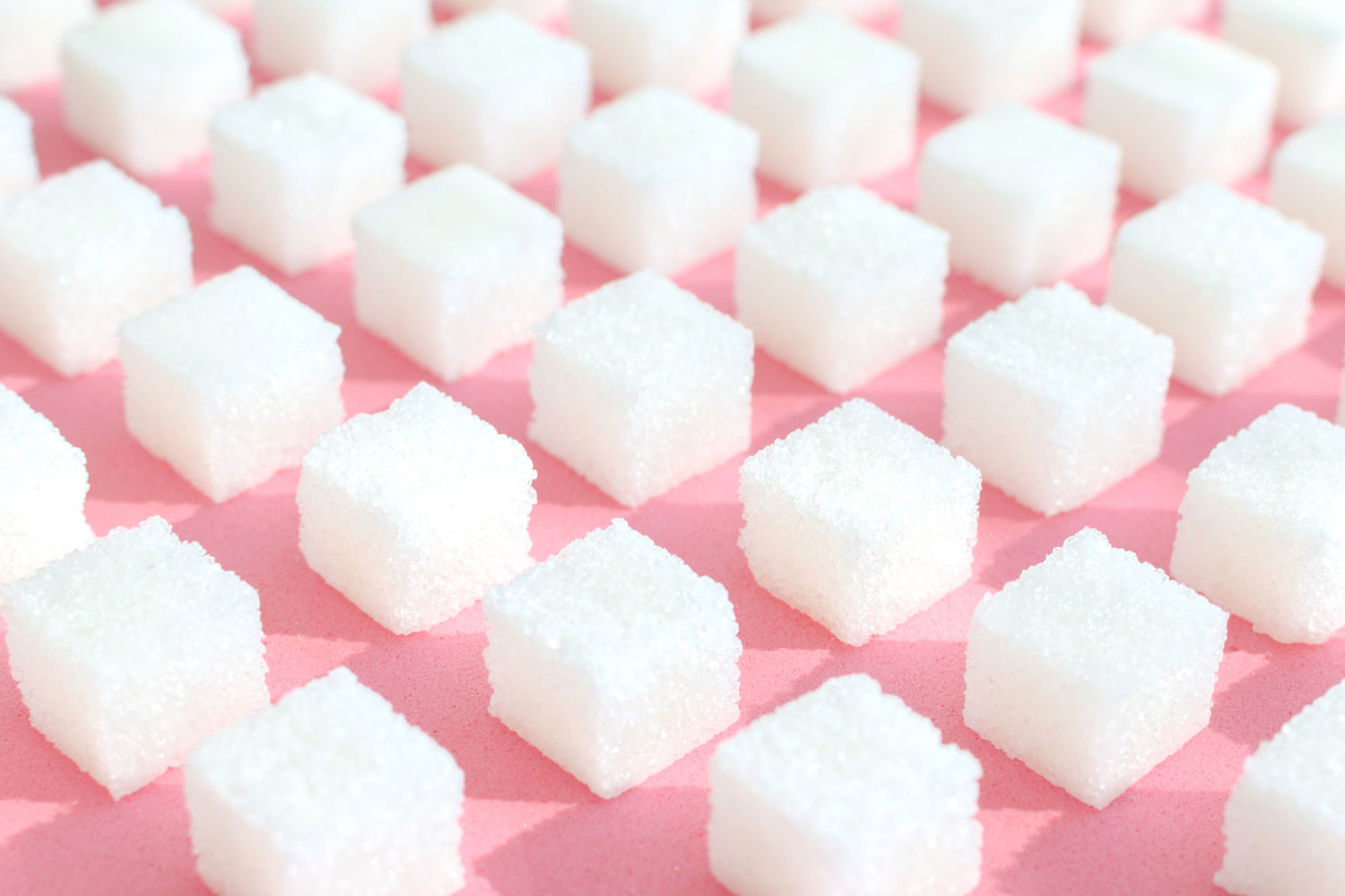 Abbildung von aufgereihten Zuckerwürfeln